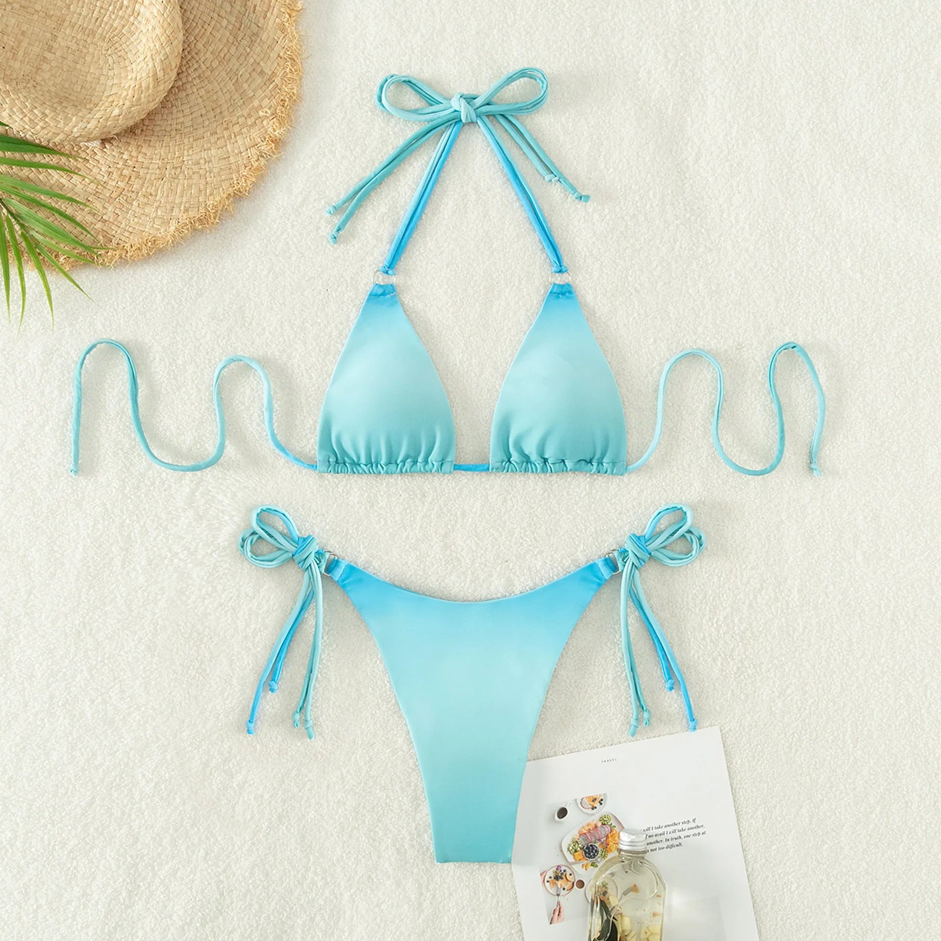 Women's gradient colour bikini swimwear set with separated top and bottom on a mannequin