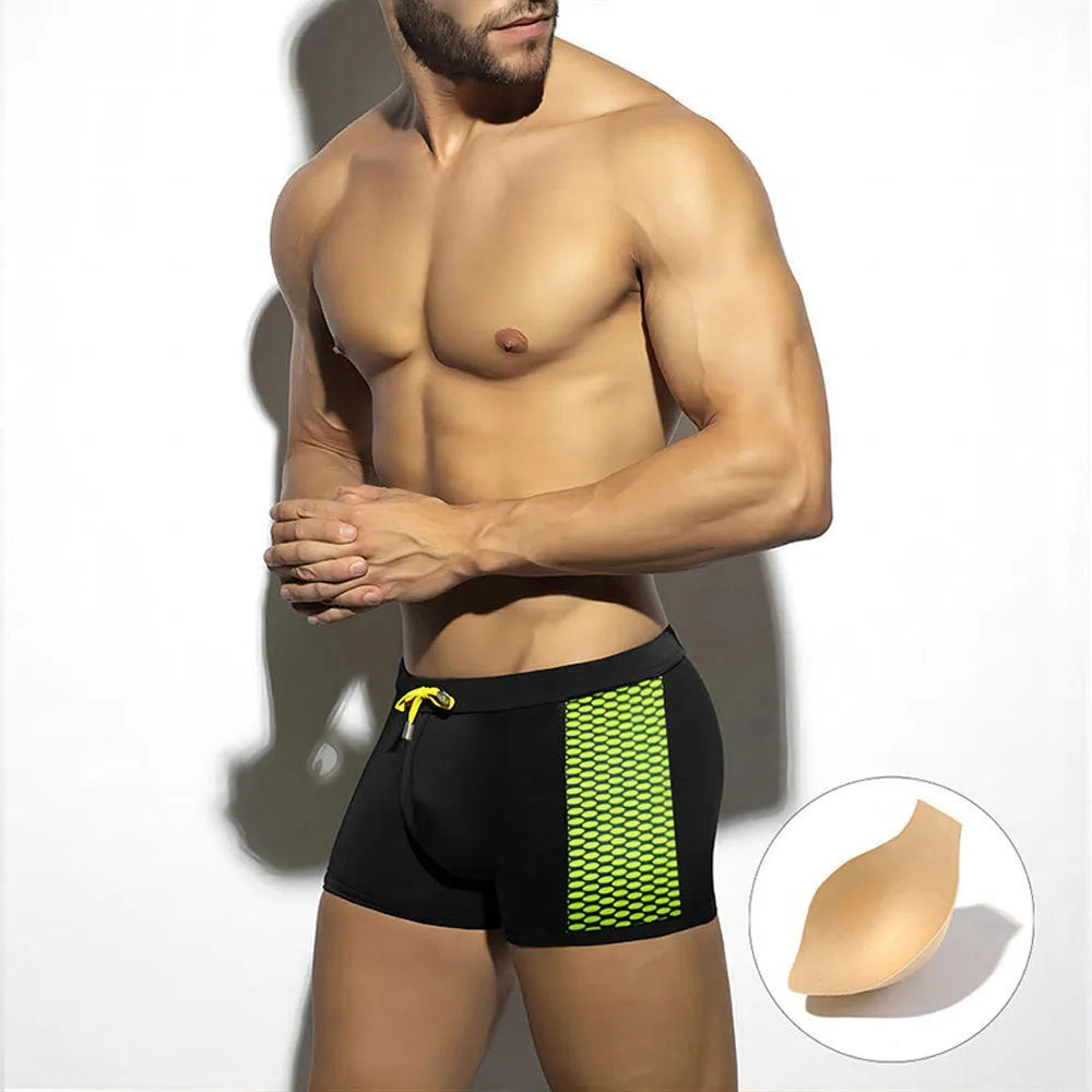 Men's yellow and black polka dot quick-dry swimming boxers with a briefs-style 3D contour fit.