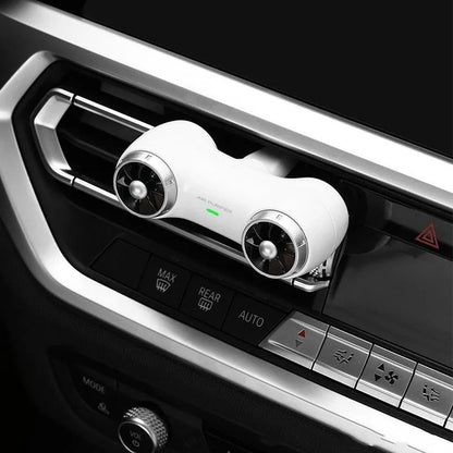 Compact black car anion air purifier with USB cable for formaldehyde removal and deodorising.