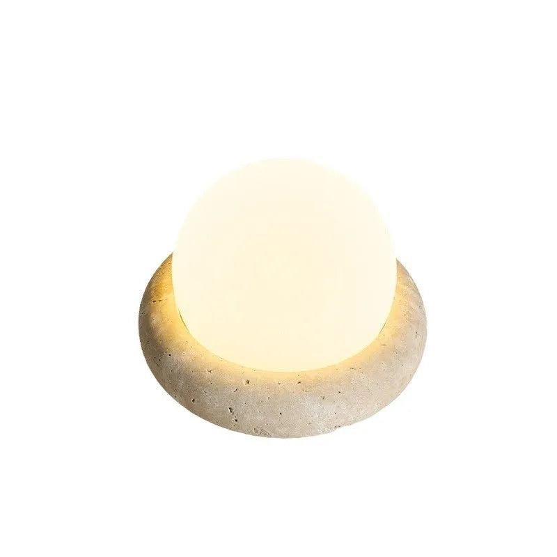 Cream coloured bedside night lamp with remote control measuring 15.5cm diameter