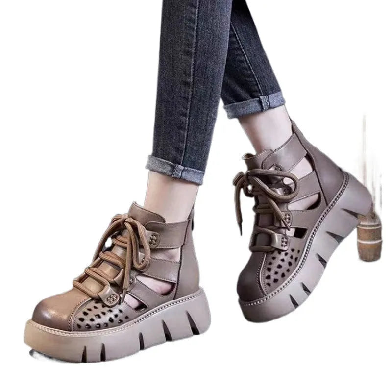 Women's platform sandals with hollow hole design in soft cowhide leather, shown in black colour with sporty styling