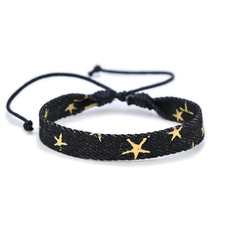 National style denim fabric bracelet carrying strap showing mixed material construction and wristband design