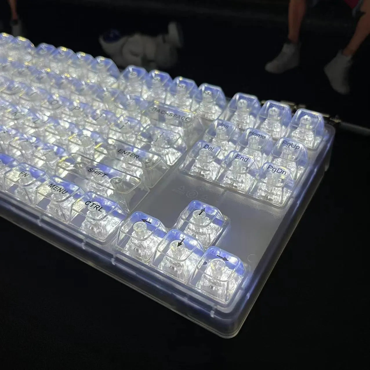 Full set of 132 transparent plastic keycaps for mechanical keyboard customisation on a white background.