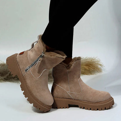 Women's black faux suede high-top snow boots with a side zipper and fur-lined collar.