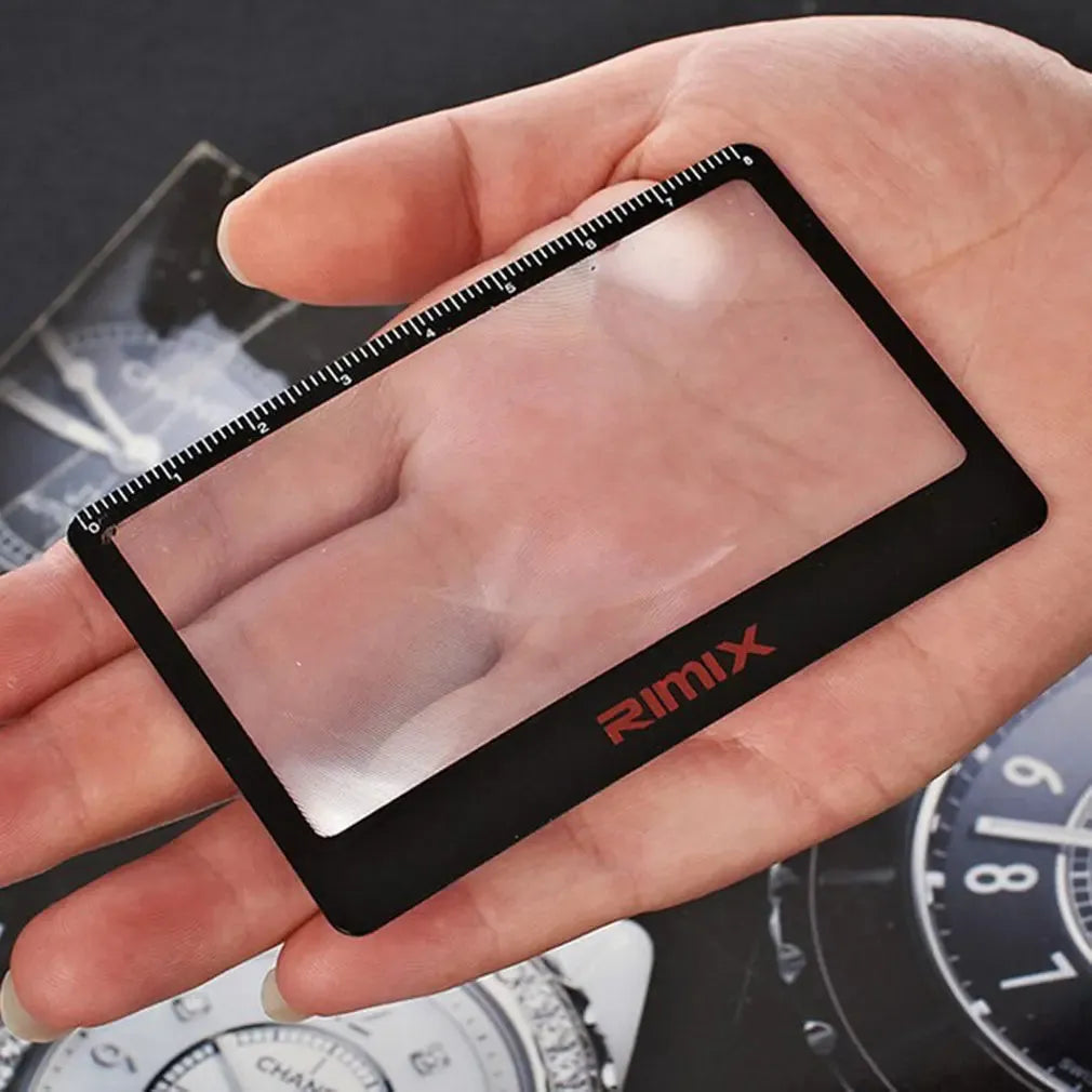 Black plastic credit card format magnifier with 3.5x lens for reading small text