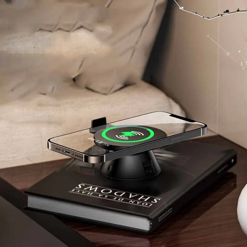 Small white plastic wireless phone charger holder with Bluetooth speaker, 12 × 10 × 6 cm, USB cable included