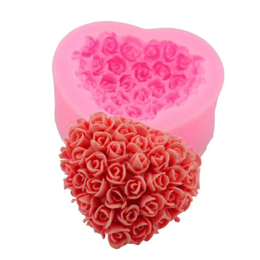 Pink silicone heart-shaped mould with a love design for Valentine's Day crafting.