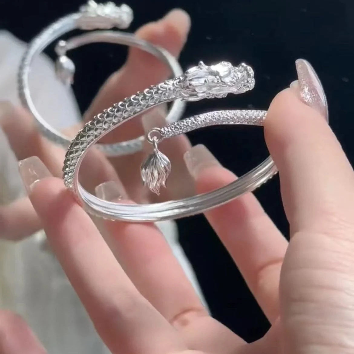 Adjustable Chinese dragon tail bangle with intricate relief design