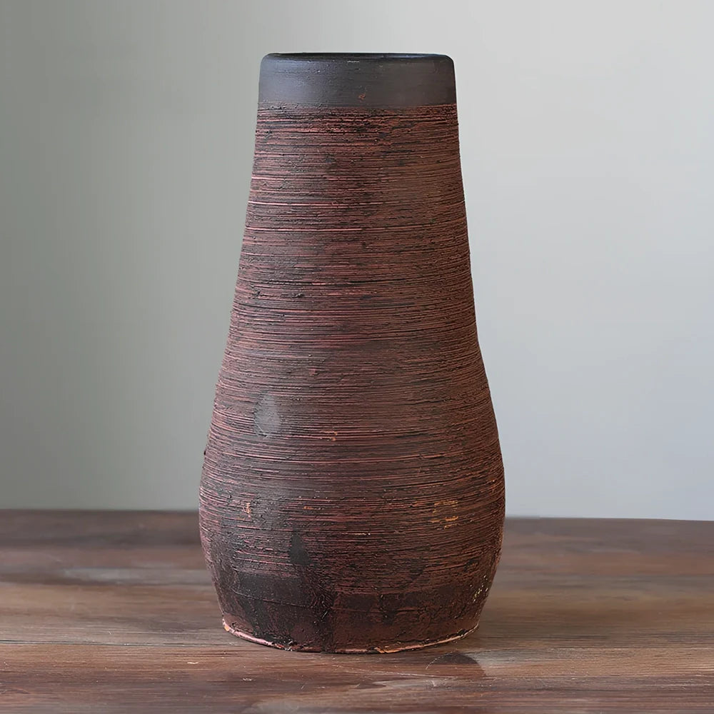 Ceramic mosaic vase with dried flower arrangement, handcrafted surface detailing