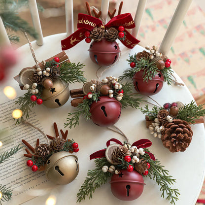 Wrought iron decorative pendant with antlers, pine cone, bowknot, and a small bell in a choice of colours.