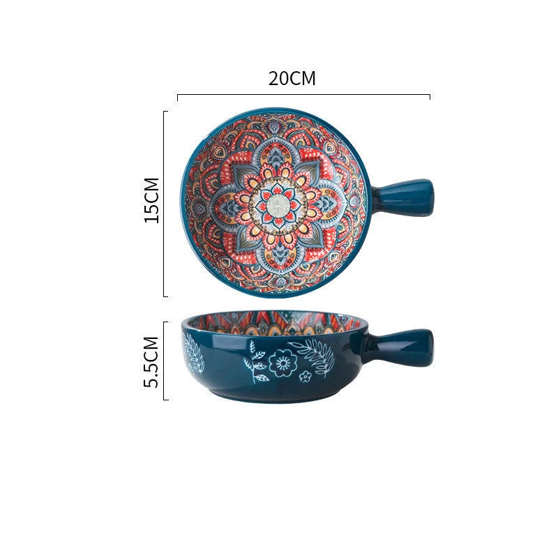 Elegant ceramic bowls with floral handles in blue, red, and green glazed finishes, perfect for serving salads and desserts