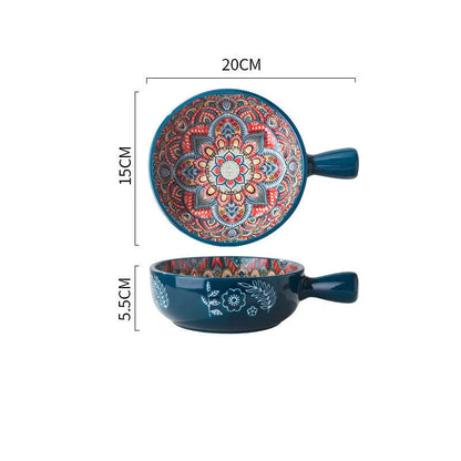 Elegant ceramic bowls with floral handles in blue, red, and green glazed finishes, perfect for serving salads and desserts