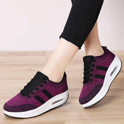 Women's solid colour platform casual shoes in flyknit with a vulcanised sole and T-shaped ribbon detail.
