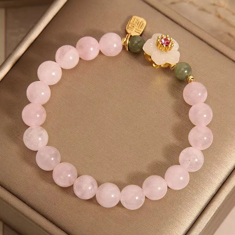 Crystal bracelet with Hetian jade elements and peach blossom design in blessing card colour