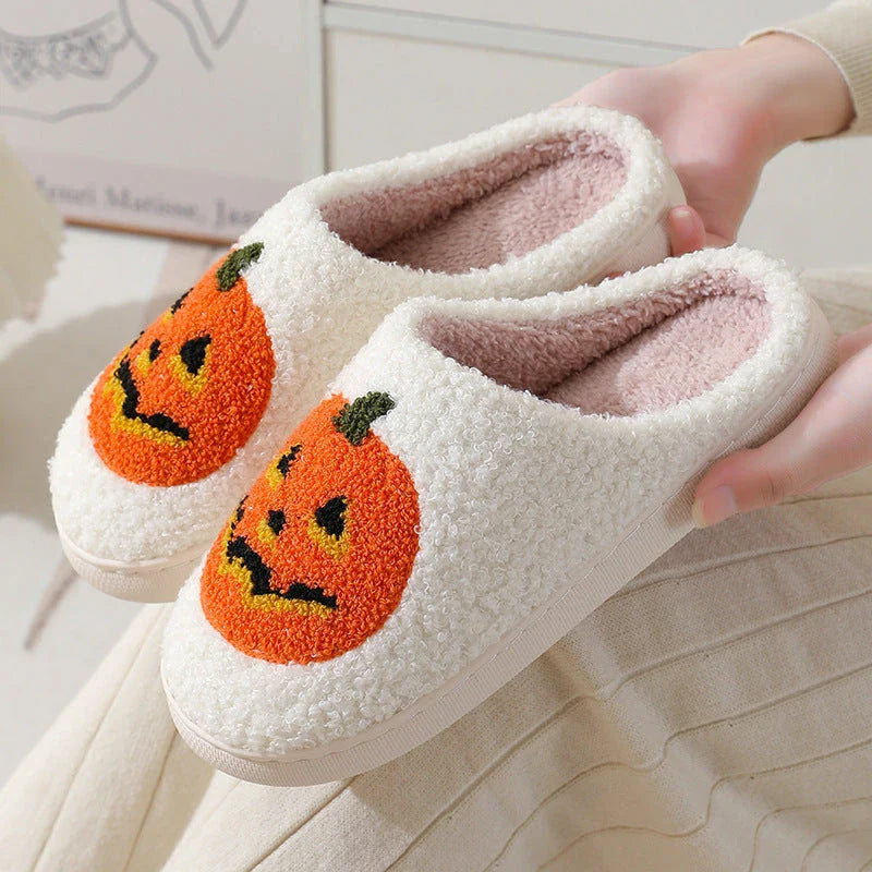 Cozy pumpkin cartoon slippers with soft suede uppers and plush cotton linings for comfortable indoor wear
