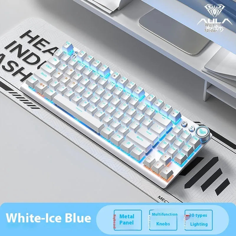 Tarantula tenkeyless wireless mechanical keyboard with side-engraved keycaps on a metal frame, showing ice blue backlighting.