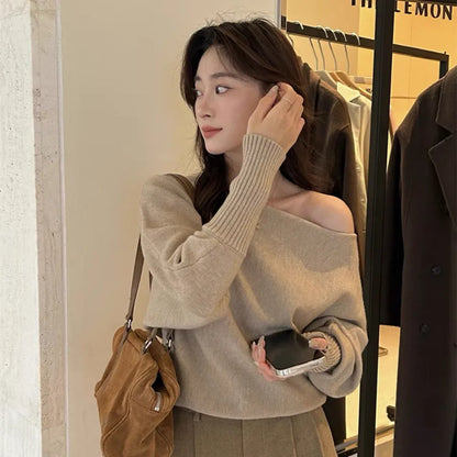Women's long sleeve viscose pullover blouse in free size shown in one of seven colours.