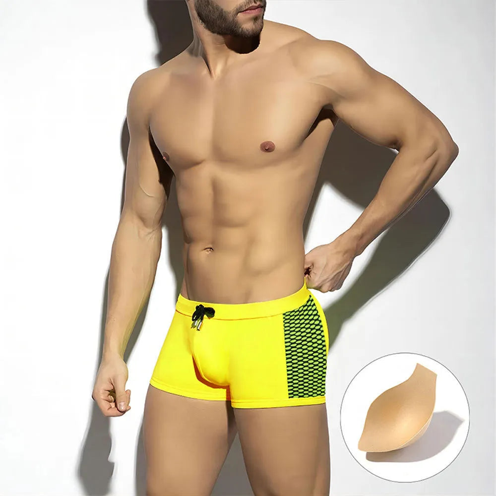 Men's yellow and black polka dot quick-dry swimming boxers with a briefs-style 3D contour fit.
