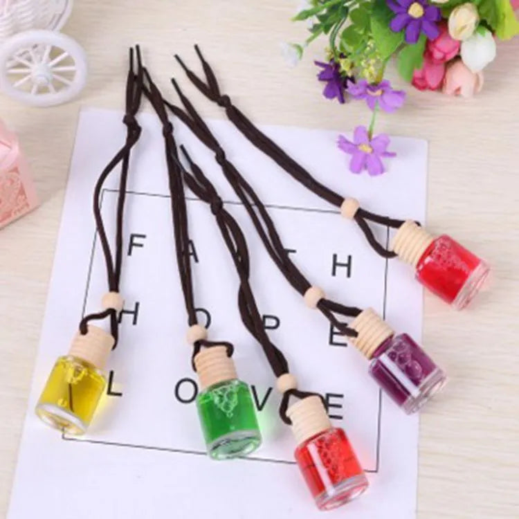 Glass bottle car air freshener hanging ornament with six scent options including lavender and lemon
