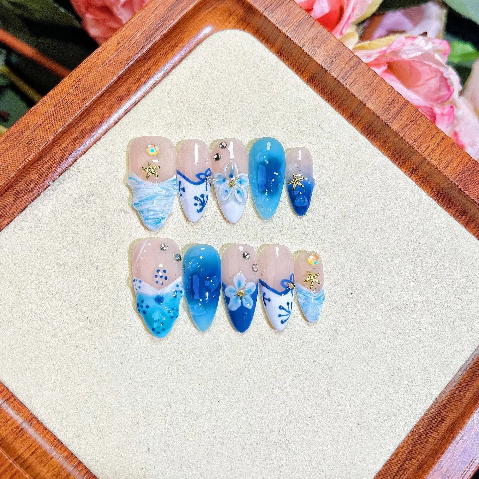 Blue hand-painted carved summer ice transparent wear fake nails set with plastic wearable armour in sizes XS, S, M, L