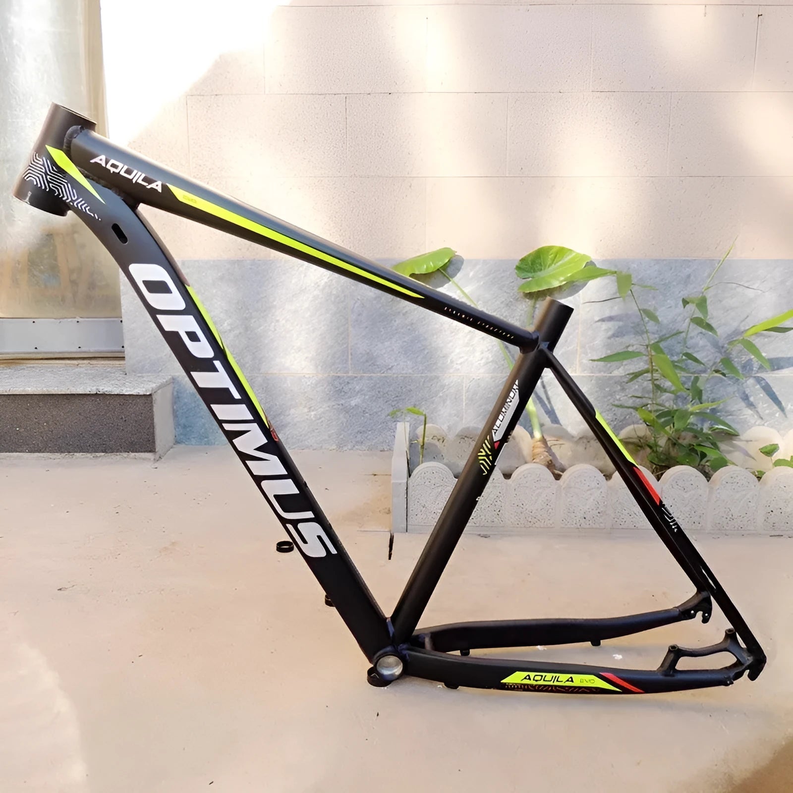 29-inch aluminium mountain bike frame in black green with disc brake mount and inner cable routing