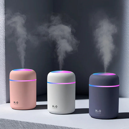 Pink car USB cup humidifier with 300ml tank and colourful lights in cup holder