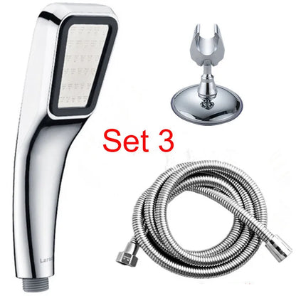 Orange hand-held pressurised shower head with rain function and attachment pieces