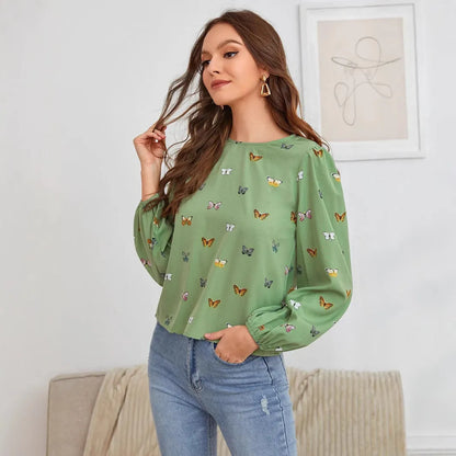 Women's butterfly print long-sleeved shirt in loose fit available in green or orange colours