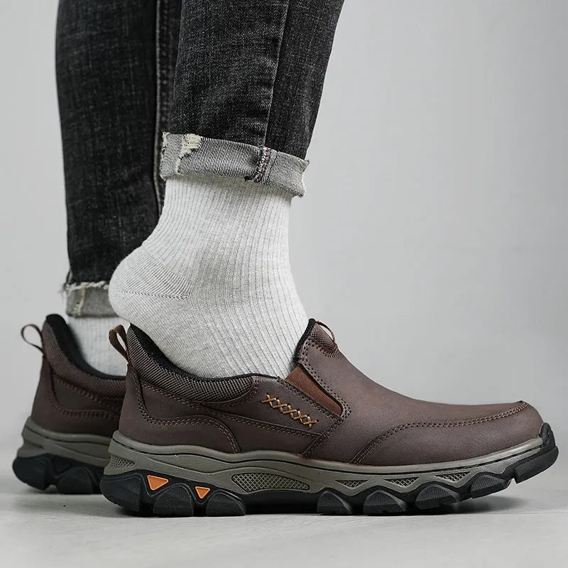 Men's round-toe casual leather shoes with a flat heel and rubber sole in black, brown, or grey.