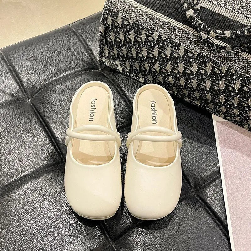 Women's baotou plastic flip-flop sandals in beige colour on a white background