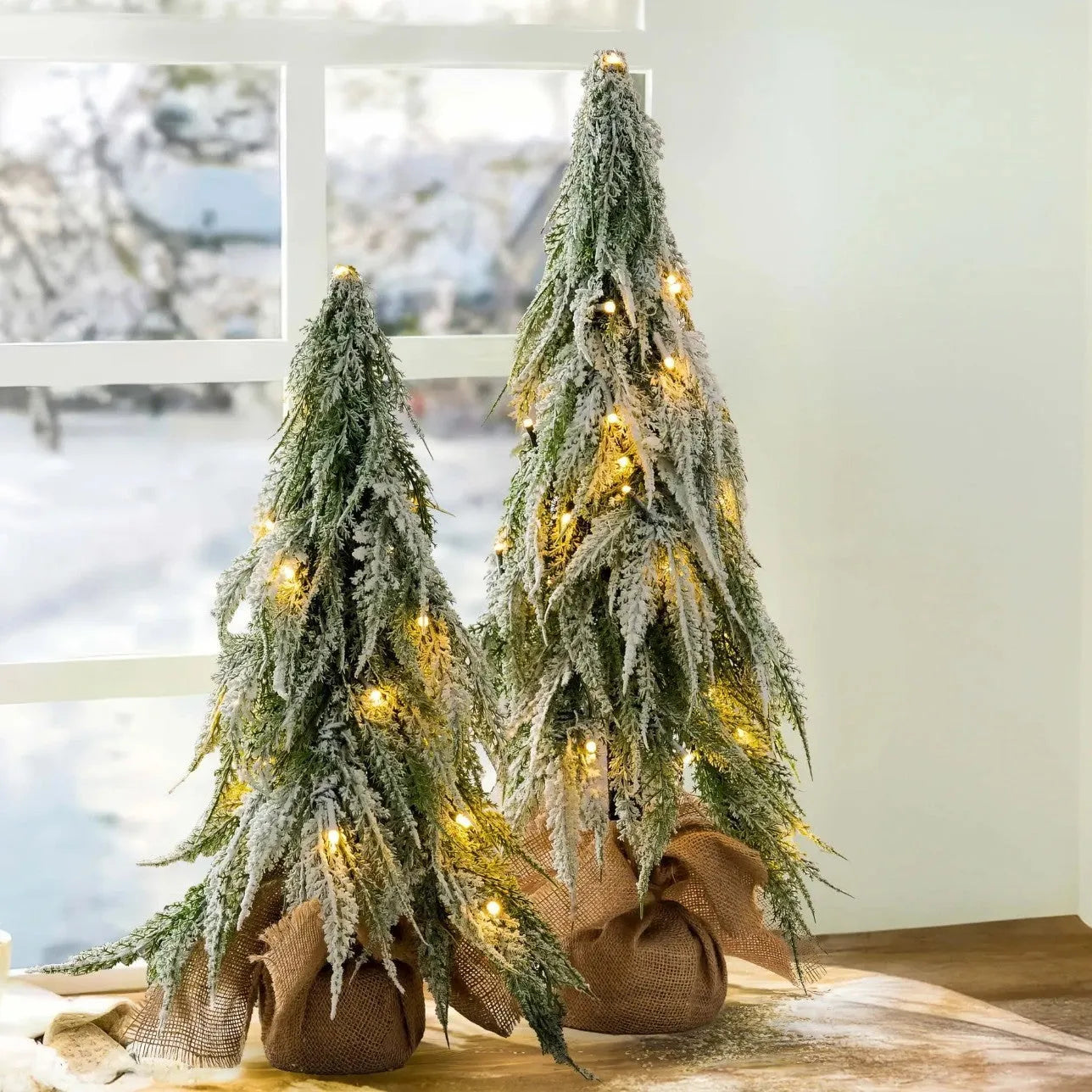 24-inch desktop Christmas tree with PE snow sprayer texture and built-in lights on plastic branches