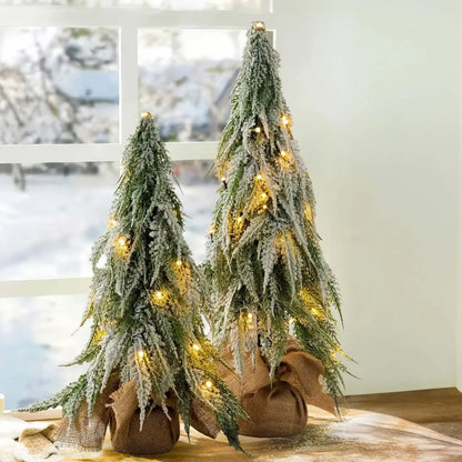 24-inch desktop Christmas tree with PE snow sprayer texture and built-in lights on plastic branches