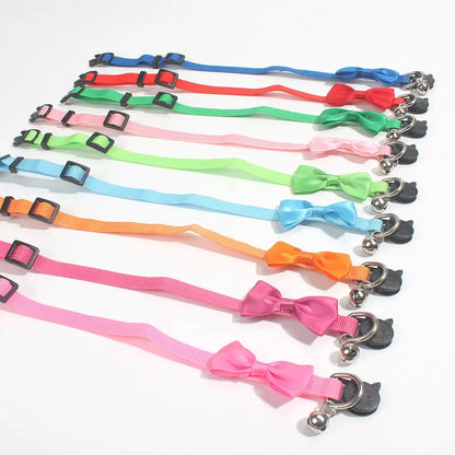 Adjustable nylon cat collar with bell decoration in striped pattern, multiple colour options available