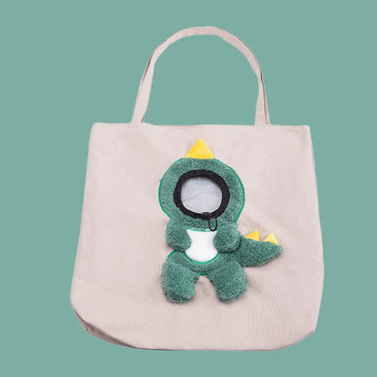 Little Bee Design blue canvas pet carrier bag with animal pattern, showing adjustable side opening for a pet's head.
