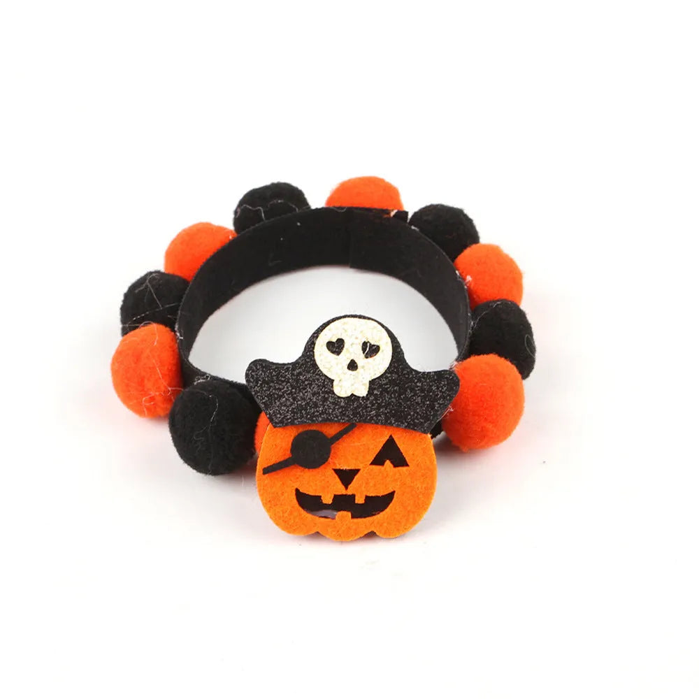 Halloween pet collar with fur ball decoration in pumpkin design