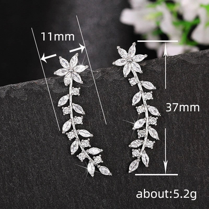 Exquisite diamond flower earrings for women in white gold, gold, and rose gold finishes