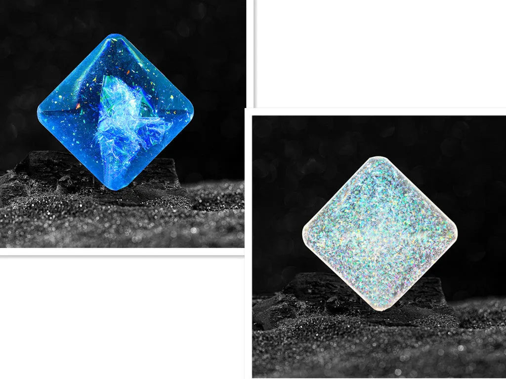 Galactic edition pocket gyro desk toy on a surface, showing its quadrilateral resin construction and celestial colour design.