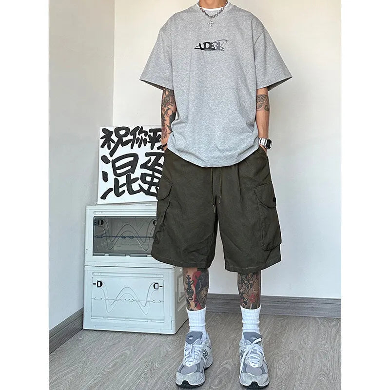 American style loose straight casual shorts in polyester fibre with micro elasticity, available in black, blue, green and khaki colours, ideal for sports and casual wear, sizes from XXS to 3XL