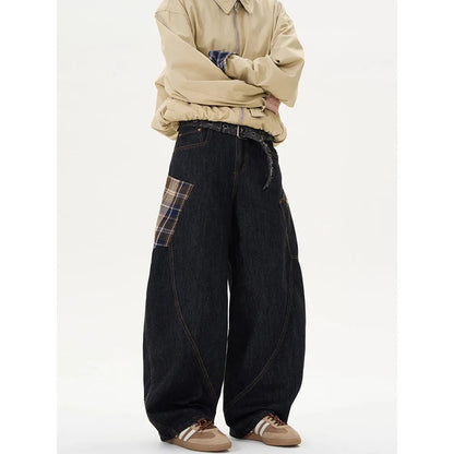 Loose straight-leg cotton trousers in a red plaid pattern, laid flat.