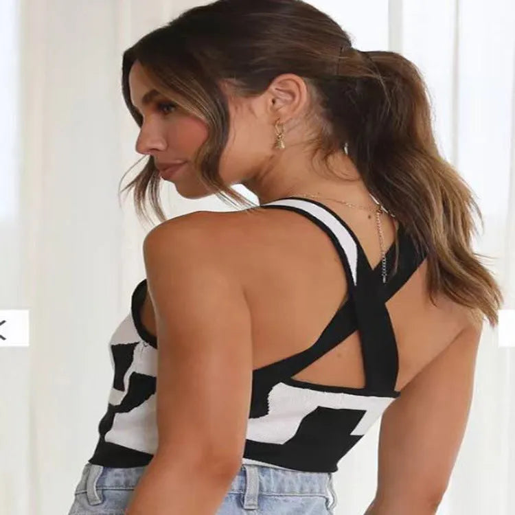 Women's white U-neck slim fit camisole vest with a crop hem, on a mannequin.