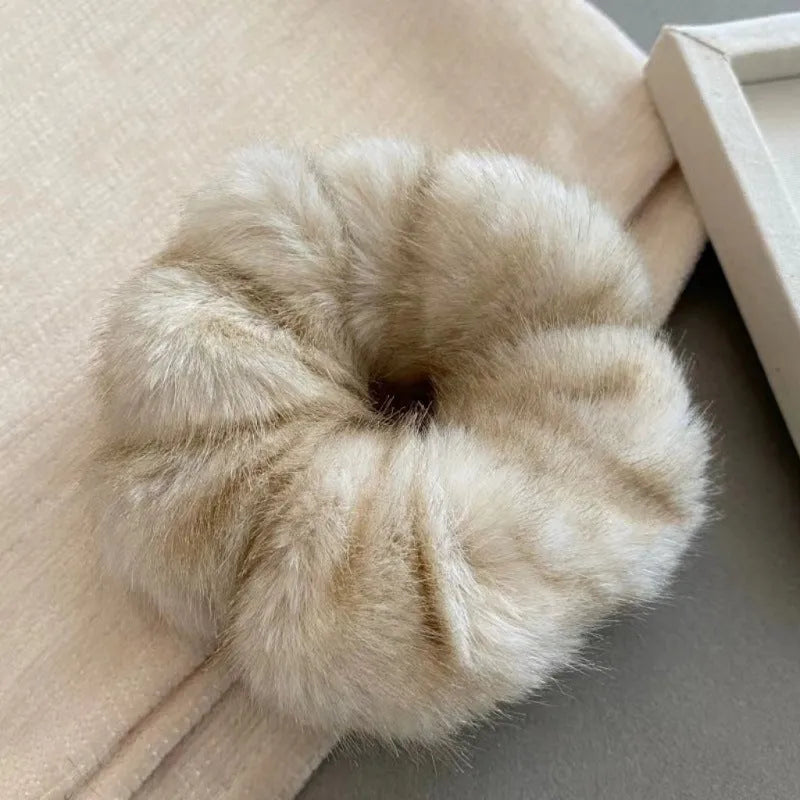 Large intestine coil hair band in mink-like waterproof fabric on a white background.