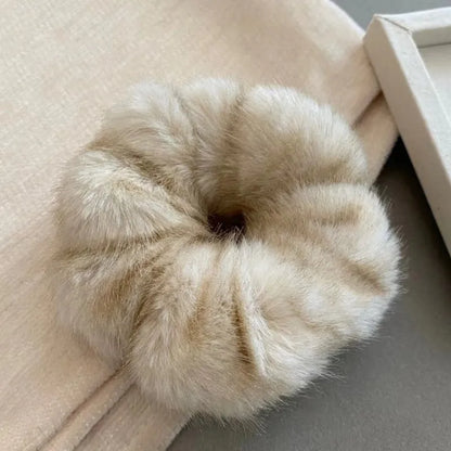 Large intestine coil hair band in mink-like waterproof fabric on a white background.