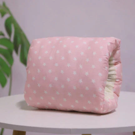 Adjustable nursing pillow with various color options, designed to provide comfort and support for breastfeeding mothers