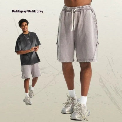 Men's batik washed cotton terry shorts in loose fit with patch craft details