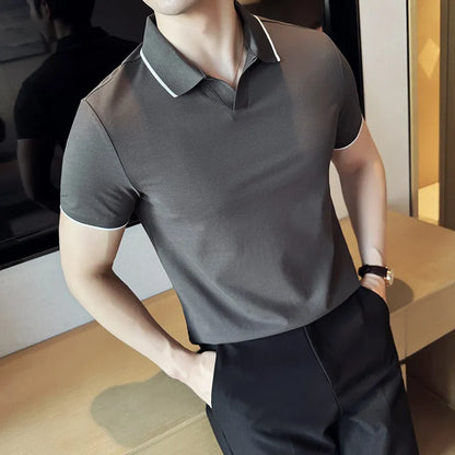 Men's solid colour short sleeve polo shirt with lapel collar on a hanger