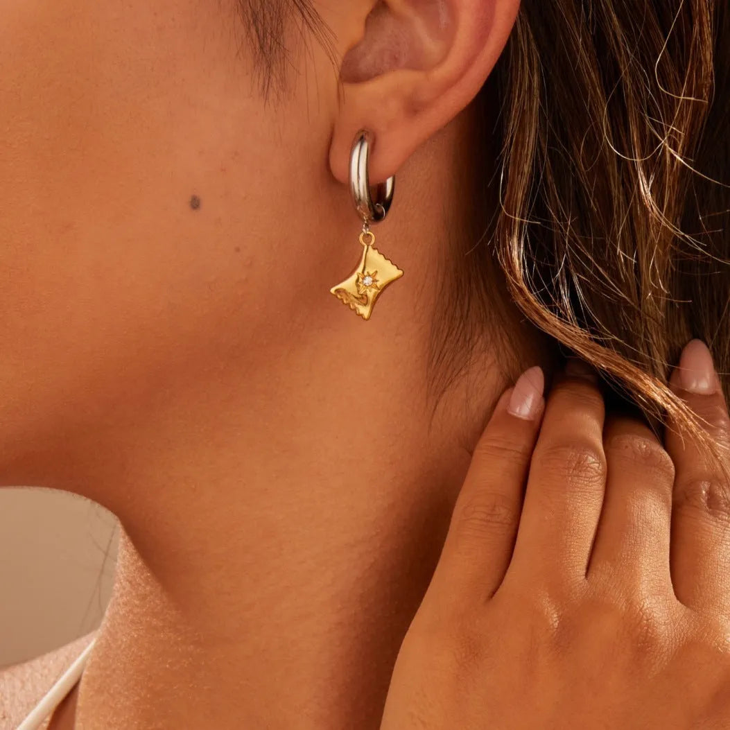 Stainless steel Christmas tree earrings with 18K electroplated finish and heart-shaped star ornament designs