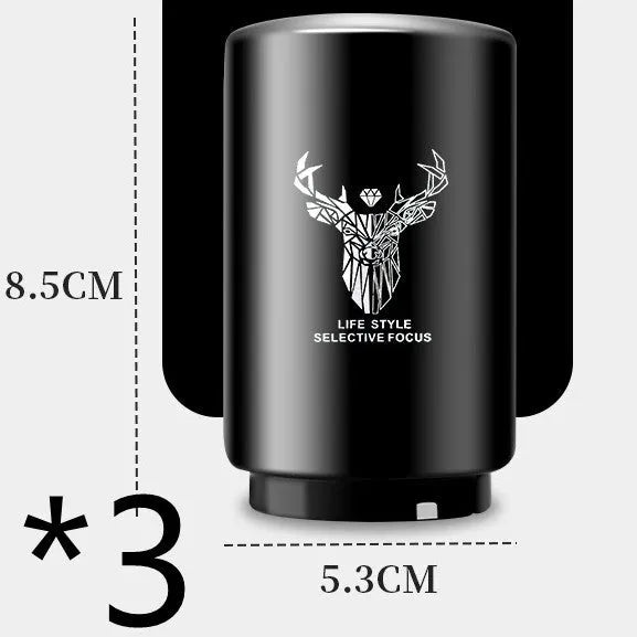 Stainless steel automatic bottle opener measuring 8.4 cm by 5.3 cm on a kitchen counter
