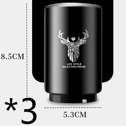 Stainless steel automatic bottle opener measuring 8.4 cm by 5.3 cm on a kitchen counter
