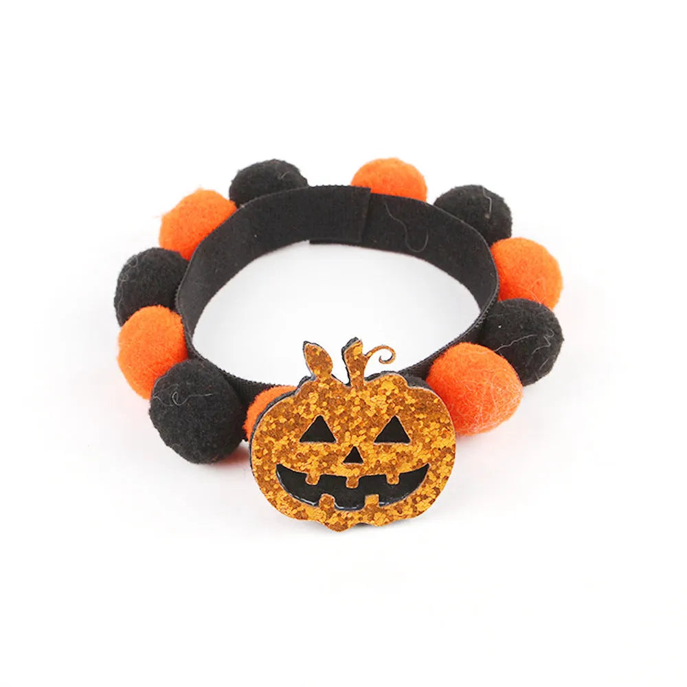 Halloween pet collar with fur ball decoration in pumpkin design