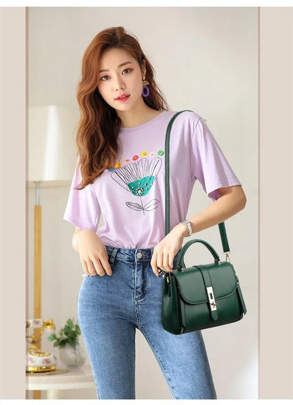Soft black PU leather women's messenger bag with adjustable strap, showing square shape and front flap.